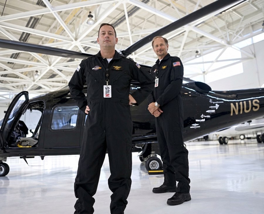 Scott Kasprowicz and Steve Sheik in the hangar with N1US